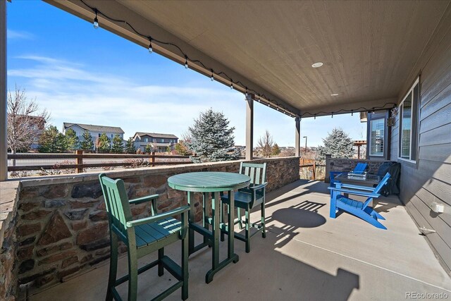 view of patio featuring a bar