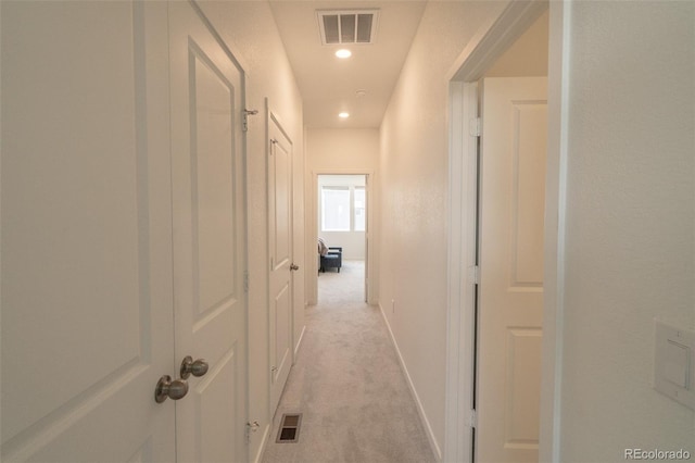 9152 Gladiola Way Unit E, Arvada, CO 80005 - hallway with light carpet, recessed lighting, and baseboards