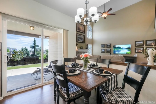 9005 Royal Melbourne Cir, Peyton, CO 80831 - dining room featuring a chandelier, wood finished floors, and ceiling fan