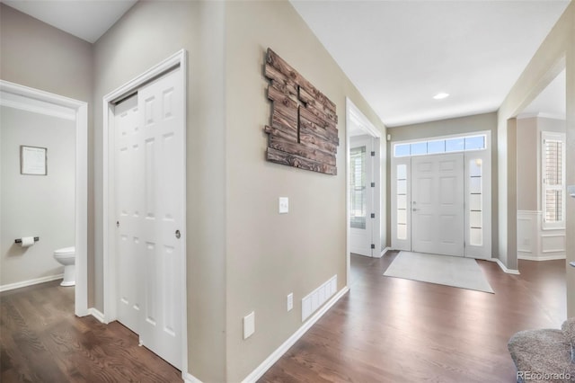 9005 Royal Melbourne Cir, Peyton, CO 80831 - foyer with dark wood-type flooring and baseboards