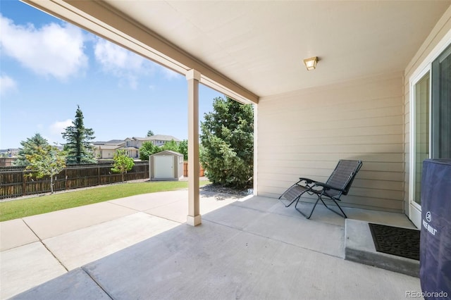 9005 Royal Melbourne Cir, Peyton, CO 80831 - view of patio with a storage shed