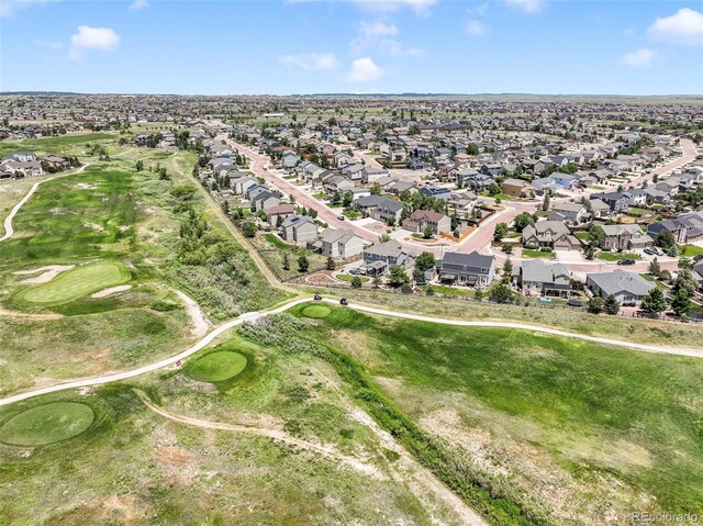 9005 Royal Melbourne Cir, Peyton, CO 80831 - aerial view of property and surrounding area with nearby suburban area and a local golf course