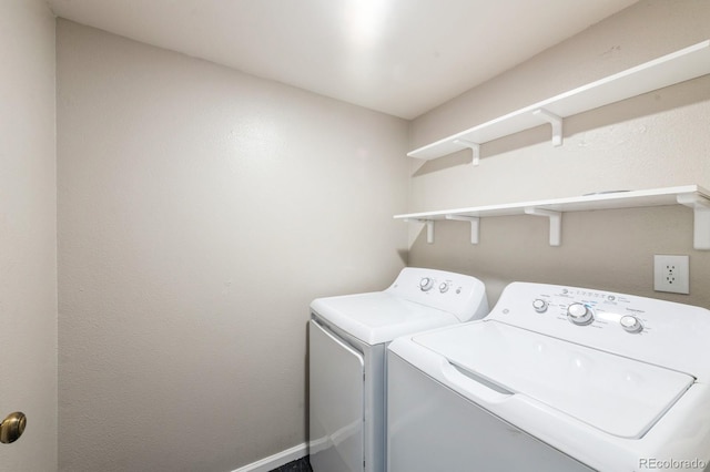 laundry area featuring washing machine and dryer