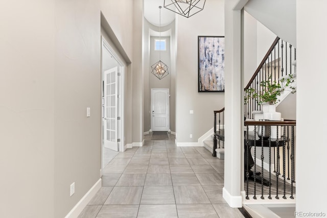 237 Maplehurst Dr, Highlands Ranch, CO 80126 - foyer featuring a high ceiling, stairway, a chandelier, and baseboards