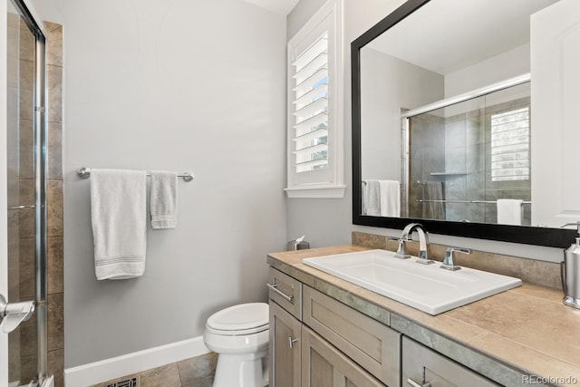 237 Maplehurst Dr, Highlands Ranch, CO 80126 - bathroom featuring plenty of natural light, vanity, and a shower stall