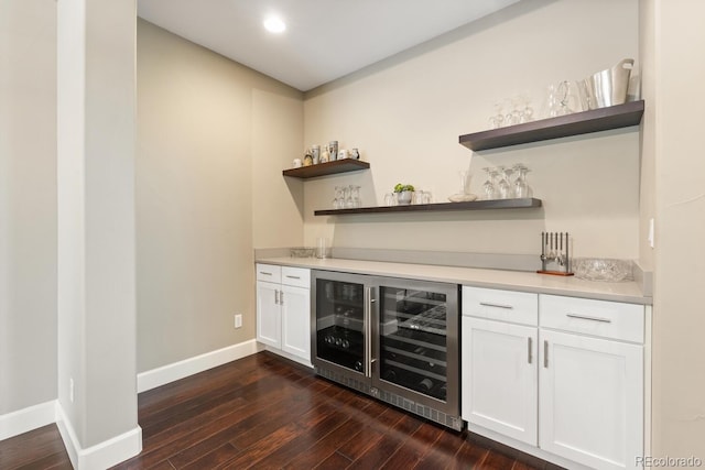 237 Maplehurst Dr, Highlands Ranch, CO 80126 - indoor dry bar featuring beverage cooler, dark wood finished floors, baseboards, and recessed lighting