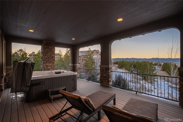 237 Maplehurst Dr, Highlands Ranch, CO 80126 - deck at dusk featuring a hot tub and a mountain view