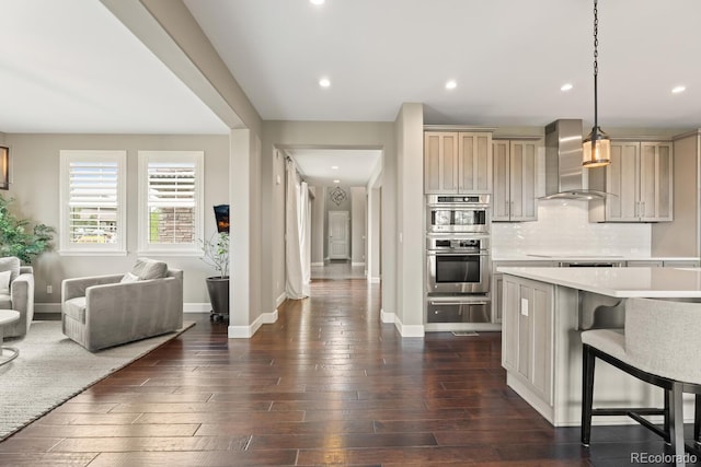 237 Maplehurst Dr, Highlands Ranch, CO 80126 - kitchen with wall chimney exhaust hood, double oven, light countertops, a warming drawer, and dark wood finished floors