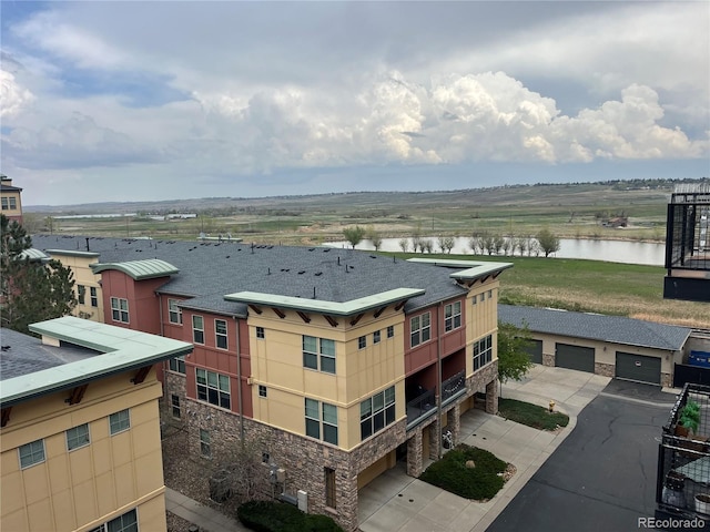 aerial view featuring a water view