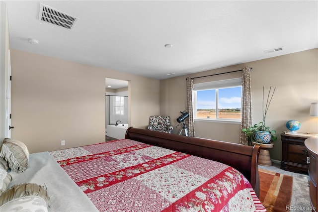 carpeted bedroom featuring baseboards