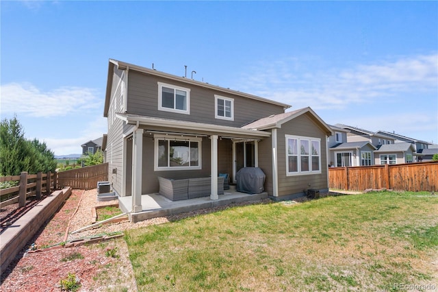 back of property featuring a patio, outdoor lounge area, and central air condition unit