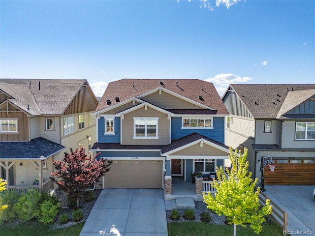 15608 E Otero Cir, Centennial, CO 80112 - view of front of home with concrete driveway and an attached garage