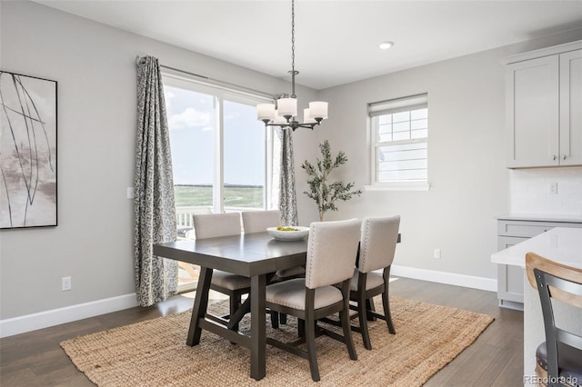 15608 E Otero Cir, Centennial, CO 80112 - dining space featuring a chandelier, baseboards, dark wood-style flooring, and recessed lighting