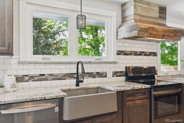6537 S Brentwood Way, Littleton, CO 80123 - kitchen with appliances with stainless steel finishes, island range hood, a sink, dark brown cabinets, and backsplash