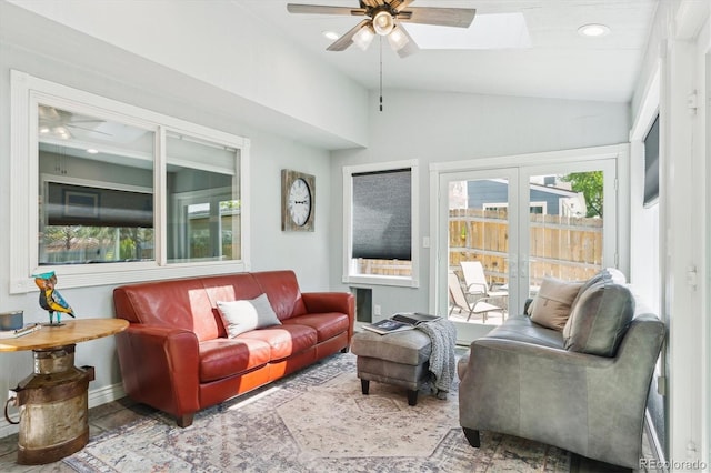 6537 S Brentwood Way, Littleton, CO 80123 - living area featuring a ceiling fan, lofted ceiling, a skylight, baseboards, and recessed lighting