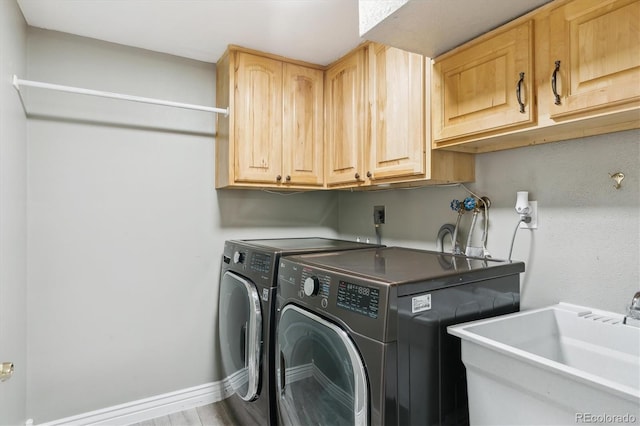 6537 S Brentwood Way, Littleton, CO 80123 - laundry area featuring cabinet space and washer and dryer