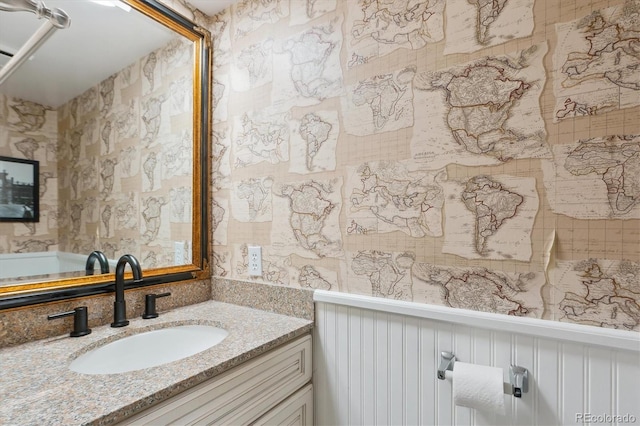6537 S Brentwood Way, Littleton, CO 80123 - bathroom with vanity and wallpapered walls