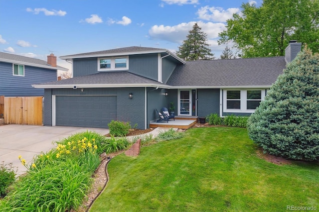 6537 S Brentwood Way, Littleton, CO 80123 - traditional-style house with driveway, an attached garage, a chimney, a shingled roof, and brick siding