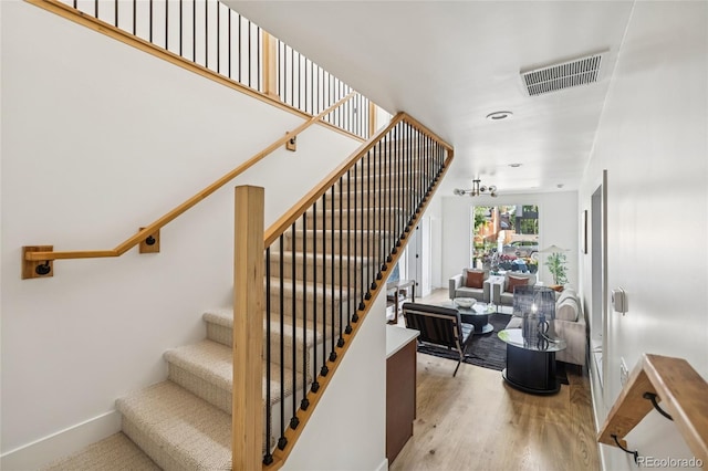 3363 W 32nd Ave, Denver, CO 80211 - stairs with baseboards and wood finished floors
