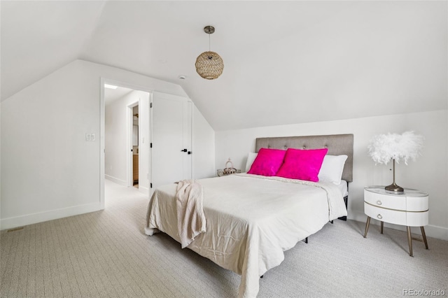 3363 W 32nd Ave, Denver, CO 80211 - carpeted bedroom featuring lofted ceiling and baseboards