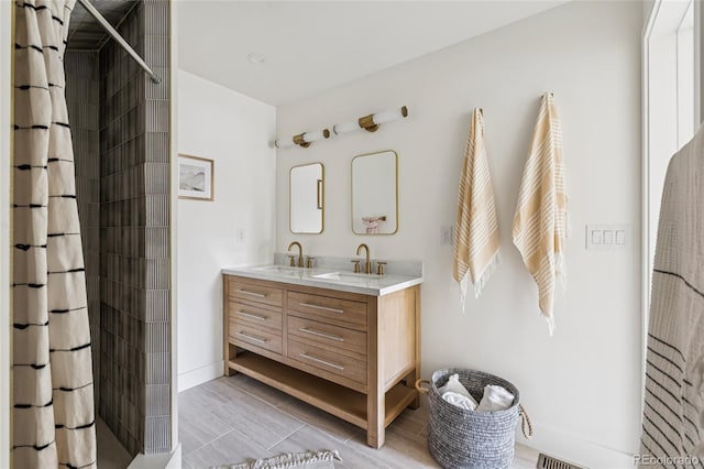 3363 W 32nd Ave, Denver, CO 80211 - bathroom with double vanity and tiled shower