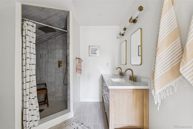 3363 W 32nd Ave, Denver, CO 80211 - bathroom with a tile shower and double vanity
