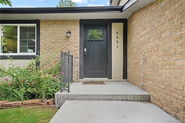 6451 S Hoyt St, Littleton, CO 80123 - entrance to property featuring brick siding