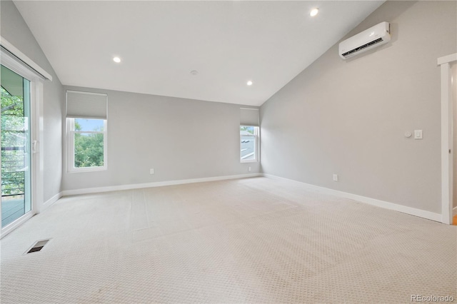 6451 S Hoyt St, Littleton, CO 80123 - unfurnished room with vaulted ceiling, light colored carpet, recessed lighting, and a wall mounted AC