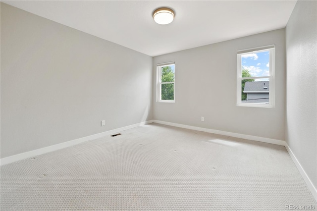 6451 S Hoyt St, Littleton, CO 80123 - empty room featuring light colored carpet
