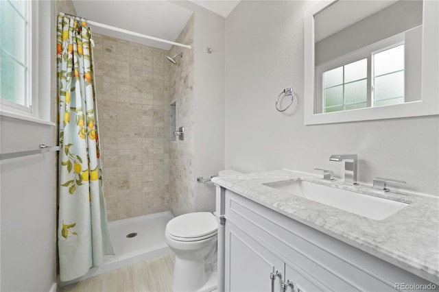 6451 S Hoyt St, Littleton, CO 80123 - full bathroom with vanity and a tile shower