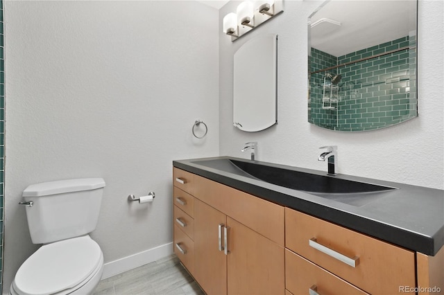 6451 S Hoyt St, Littleton, CO 80123 - bathroom with vanity and a tile shower