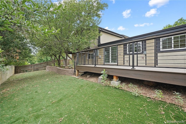 6451 S Hoyt St, Littleton, CO 80123 - fenced backyard with a wooden deck