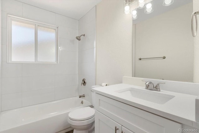 full bathroom with vanity, toilet, and shower / bathtub combination