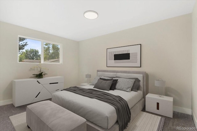 bedroom featuring baseboards and light carpet