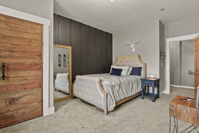 bedroom featuring light carpet