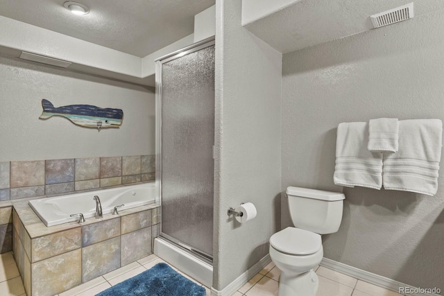 bathroom with tile patterned flooring, a textured ceiling, toilet, and plus walk in shower