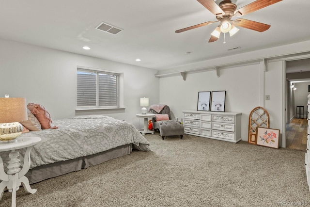 bedroom with ceiling fan and carpet