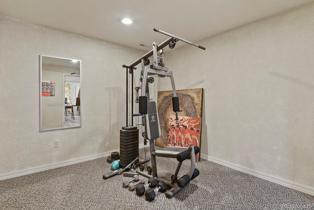 exercise area featuring carpet