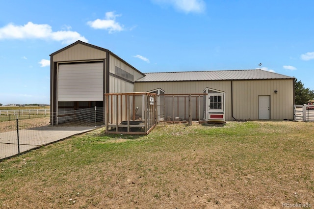 view of outdoor structure with a yard