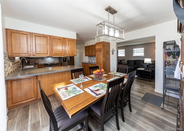 dining space with light wood finished floors