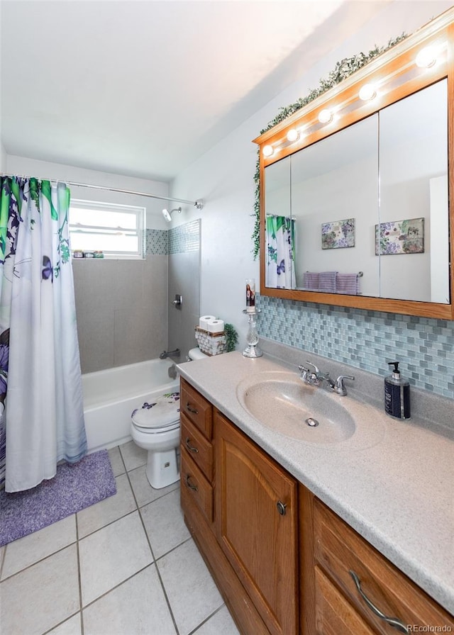 bathroom with tile patterned flooring, vanity, shower / bath combination with curtain, and toilet