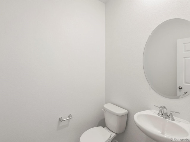 4694 Sugarcane St, Johnstown, CO 80534 - bathroom with a sink and toilet