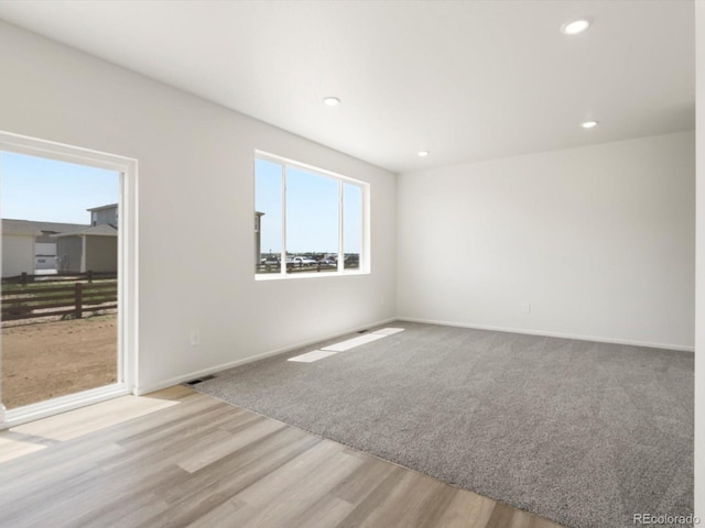 4694 Sugarcane St, Johnstown, CO 80534 - unfurnished room featuring recessed lighting and wood finished floors