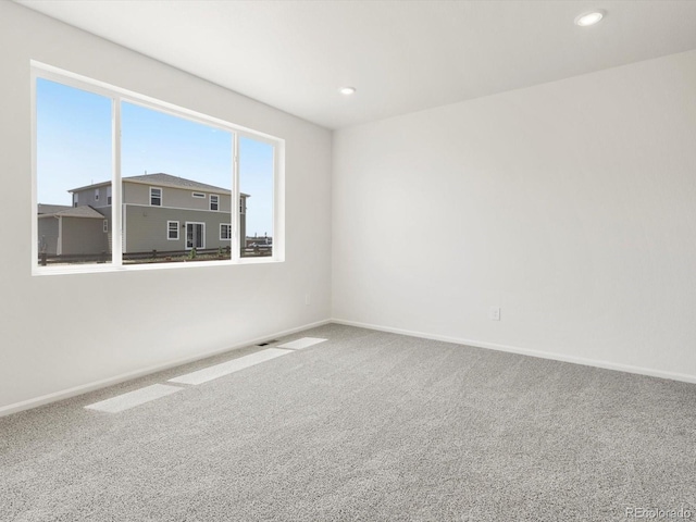 4694 Sugarcane St, Johnstown, CO 80534 - unfurnished room featuring carpet and recessed lighting