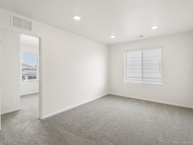 4694 Sugarcane St, Johnstown, CO 80534 - carpeted empty room with baseboards and recessed lighting