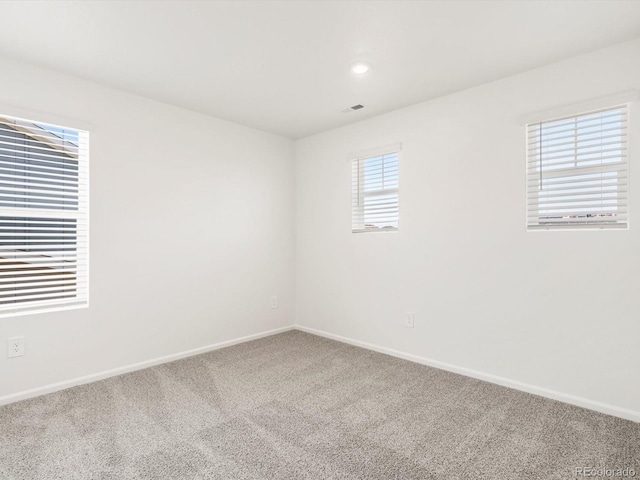 4694 Sugarcane St, Johnstown, CO 80534 - carpeted empty room with baseboards and recessed lighting