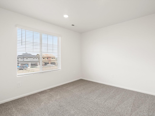 4694 Sugarcane St, Johnstown, CO 80534 - spare room with carpet floors and recessed lighting