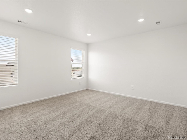 4694 Sugarcane St, Johnstown, CO 80534 - spare room featuring carpet floors and recessed lighting