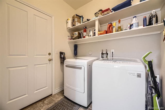 washroom featuring laundry area and independent washer and dryer