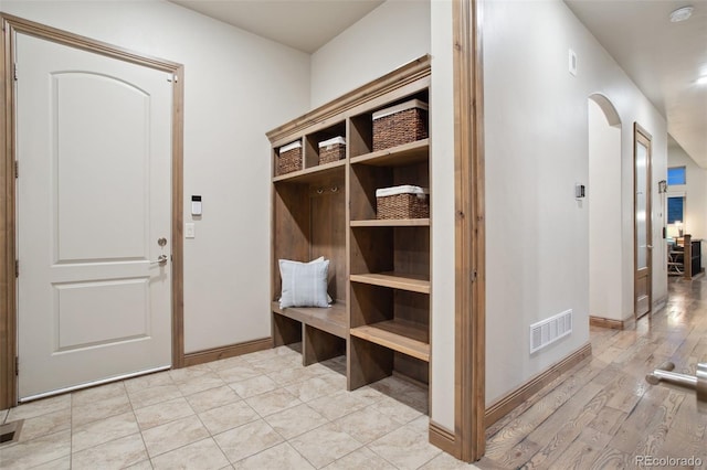 mudroom featuring light wood-type flooring